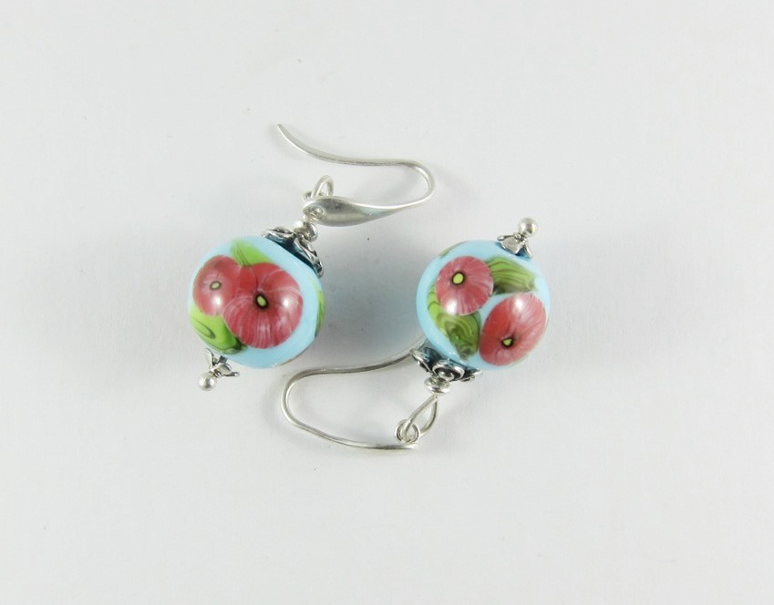 JER0789 Earrings sky blue with floral design